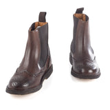 Brogue ankle boots in brown calfskin leather