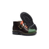 Single buckles boot in brown calf leather with green rubber tip