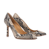 Décolleté stiletto heels calfskin leather reptile effect.