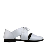 Shoes with open upper in white leather