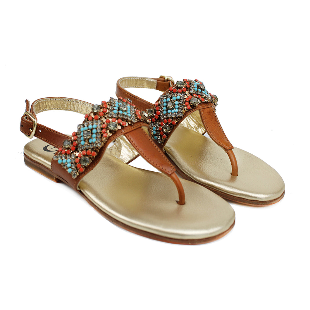 Flip Flops in tan leather with ethnic accessories