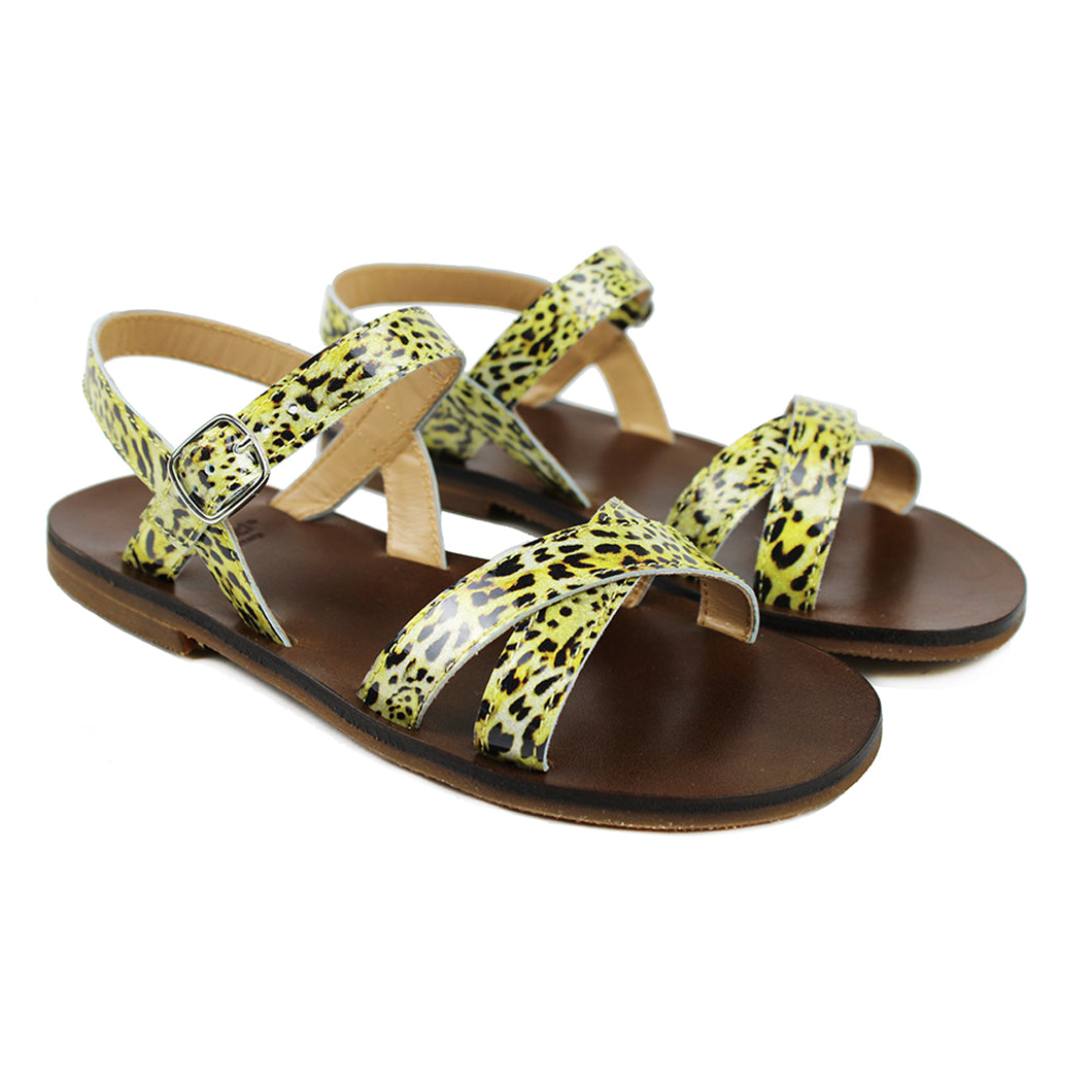 Sandals in printed patent leather