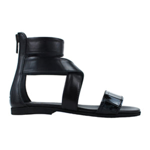 Sandals in black leather and exotic details