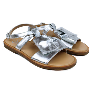 Sandals in silver leather with big tassels on top