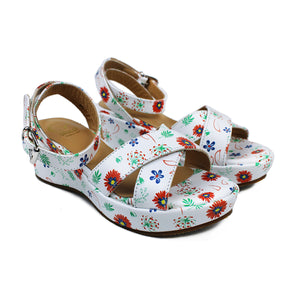 Sandals in white leather with platform and iconic flower print
