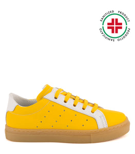 Yellow leather sneakers with amber sole