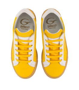 Yellow leather sneakers with amber sole