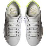 White leather sneakers with fluo details