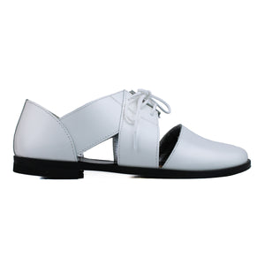Shoes with open upper in white leather