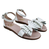 Sandals in white patent leather and leather butterfly on strap