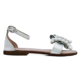 Sandals in white patent leather and leather butterfly on strap