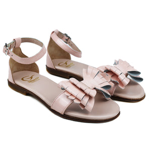 Sandals in pink patent leather and leather butterfly on strap