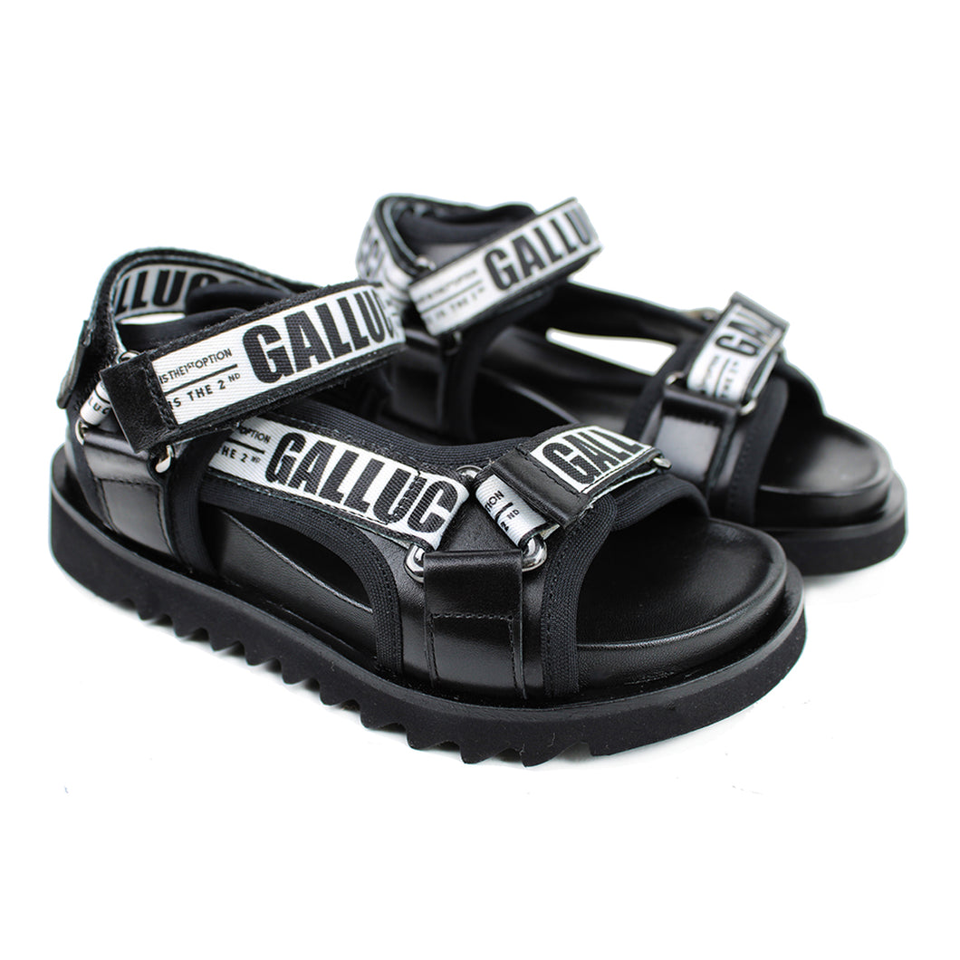 Sandals black leather with signature Gallucci strap and shark tooth sole