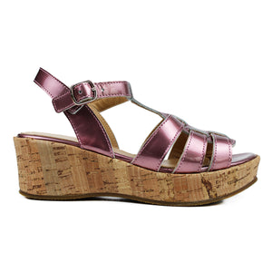 Sandals in pink patent leather and cork platform
