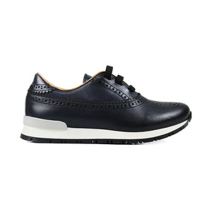 Sneaker in handmade colored blue leather and light sole