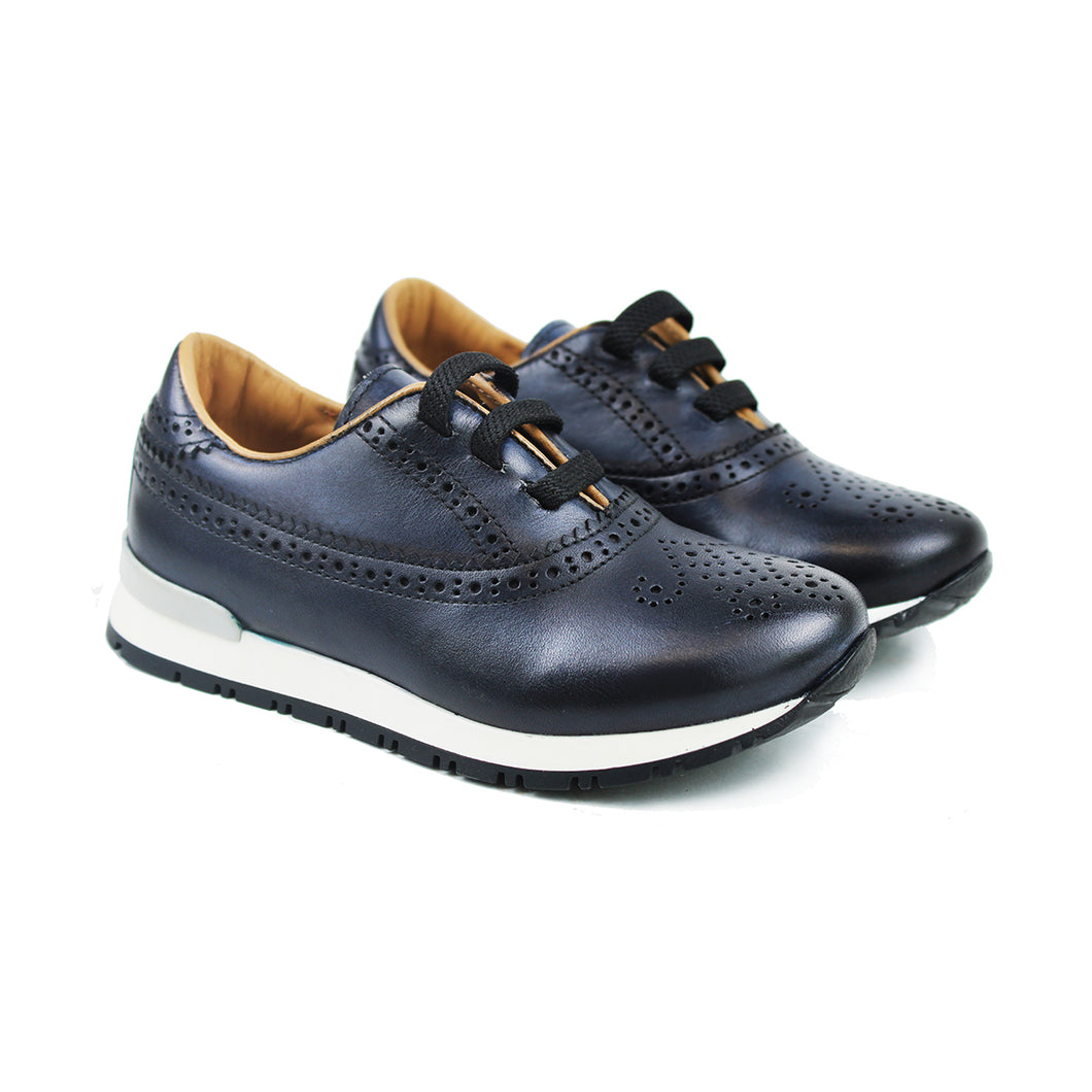 Sneaker in handmade colored blue leather and light sole