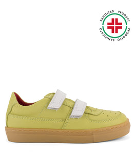 Green leather sneakers with amber sole