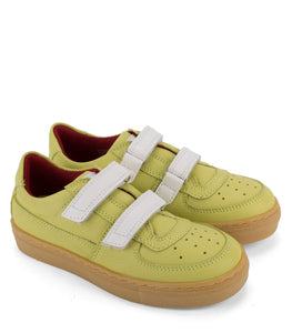 Green leather sneakers with amber sole