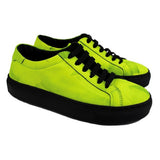 Sneaker in black leather with yellow fluo patina