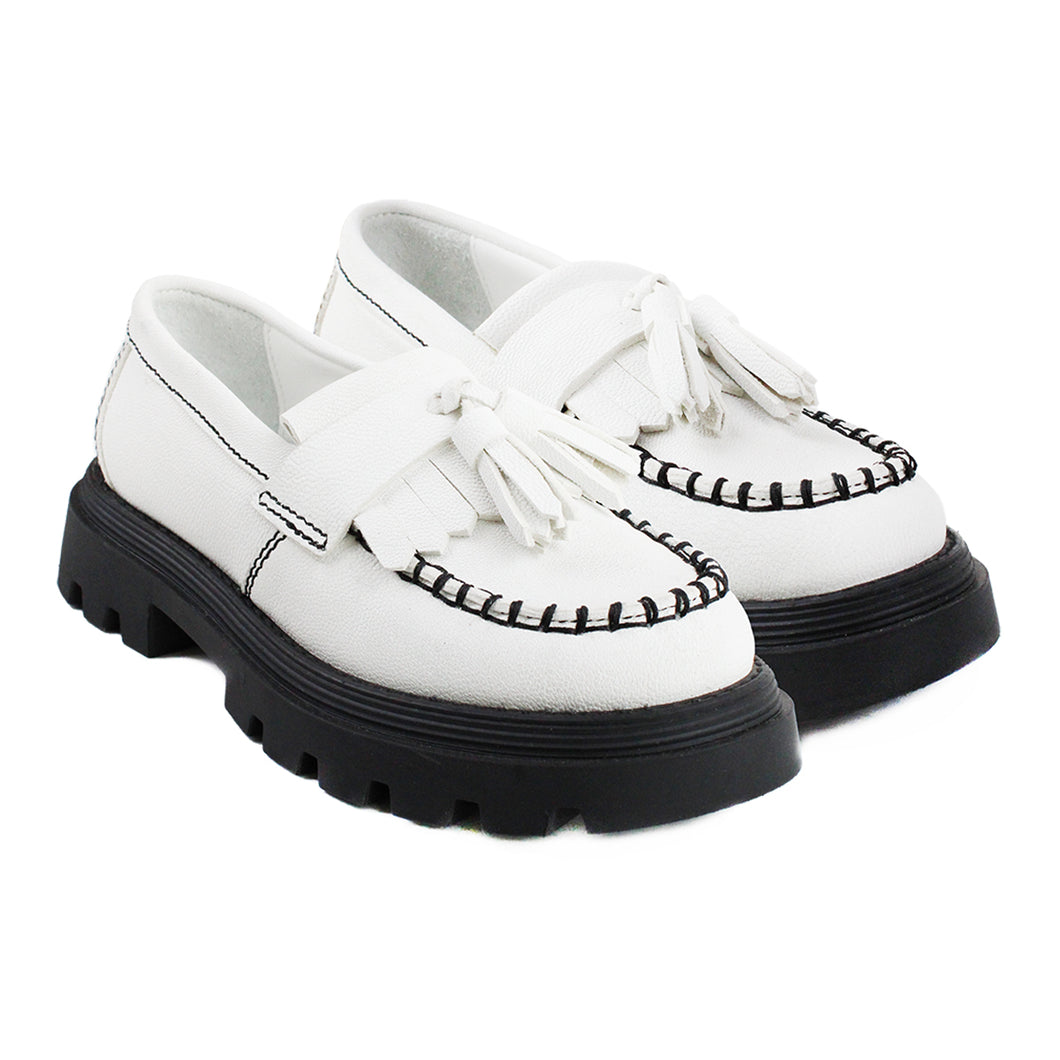White calfskin tassel loafers with chunky black sole